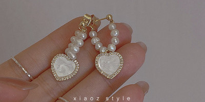 Női fülbevaló szíves medállal