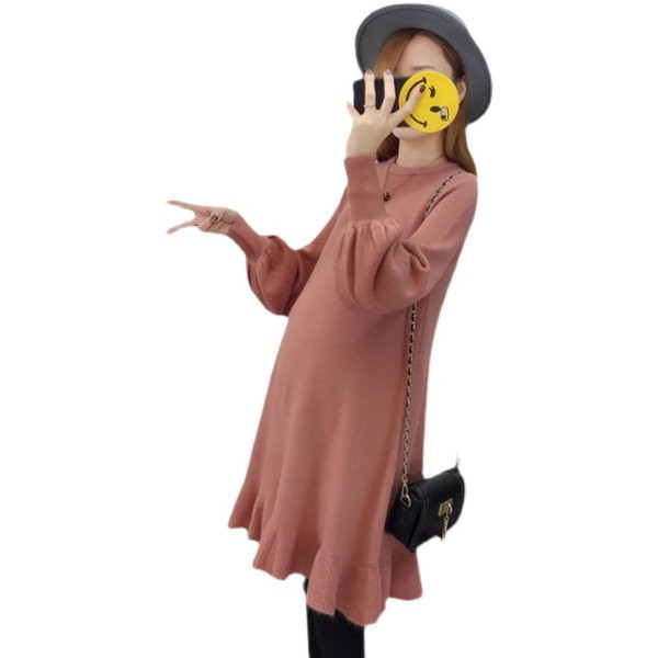 Hosszú kötött tunika fürtökkel terhes nők számára