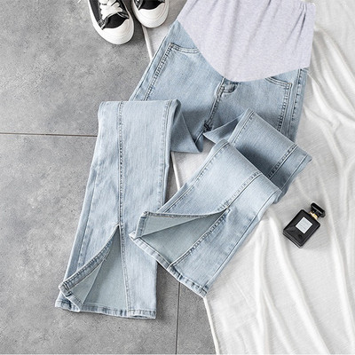 Új modellű női vékony szabású kismamafarmer, hasítékkal