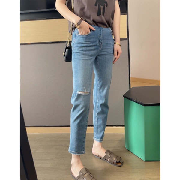 Új modell női farmer szakadt motívumokkal kismamáknak