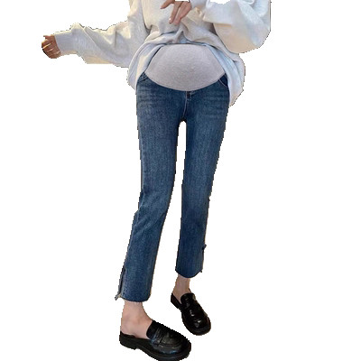 Női farmer terhes nőknek magas derékkal - egyenes modell, oldalsó hasítékkal