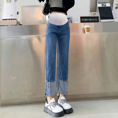 Sport modell, gombos farmernadrág terhes nők számára