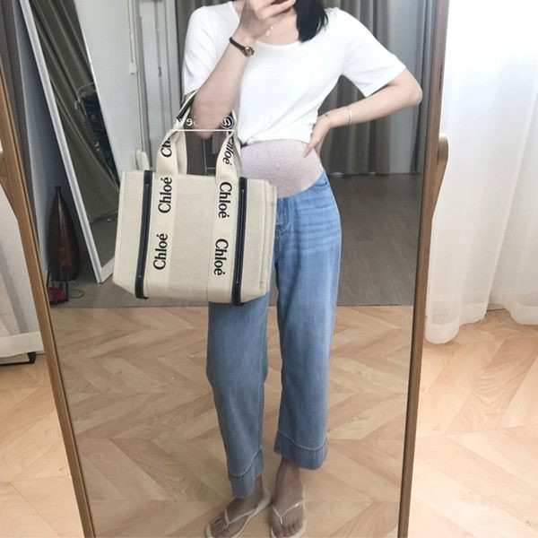 Női, magas derekú kismamafarmer - bő minta