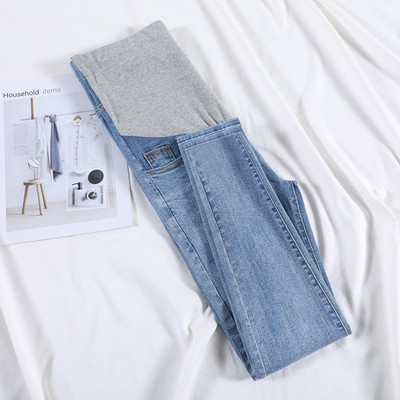 Moteriški džinsai nėščiosioms aukštu juosmeniu - švarus tiesus modelis