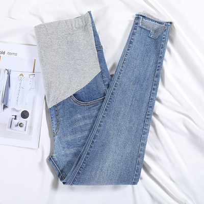 Moteriški džinsai nėščiosioms aukštu juosmeniu - švarus tiesus modelis