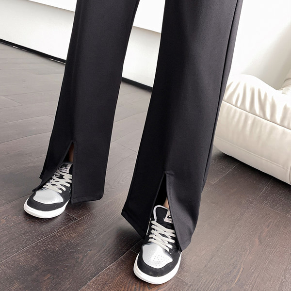 Elegáns női kismamanadrág hasítással