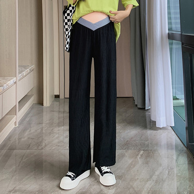 Női hosszú nadrág terhes nőknek - letisztult bő minta