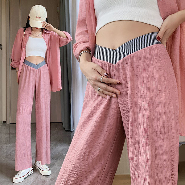 Vágott kismamanadrág alacsony elasztikus derékkal