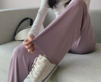 Női hosszú nadrág terhes nőknek - magas derekú bő mintával