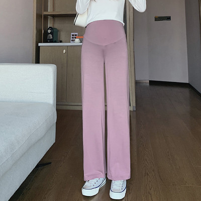 Női hosszú nadrág terhes nőknek - magas derekú bő mintával