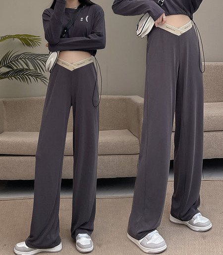 Női hosszú nadrág terhes nőknek - bő mintával, alacsony derékkal