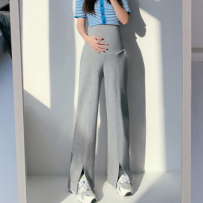 A mindennapi élethez megfelelő széles modell kismamanadrág, magas derékkal