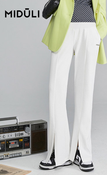 Naiste pikad püksid rasedatele – kõrge pihaosa avara mustriga