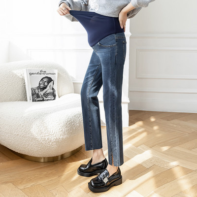 Magas derekú, egyenes szárú kismamafarmer hasítékkal