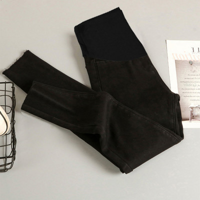 Női kismamanadrág széles övvel