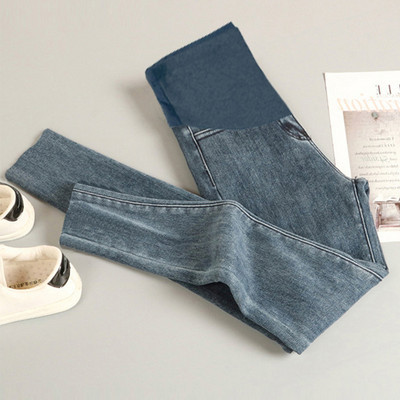 Női kismamanadrág széles övvel