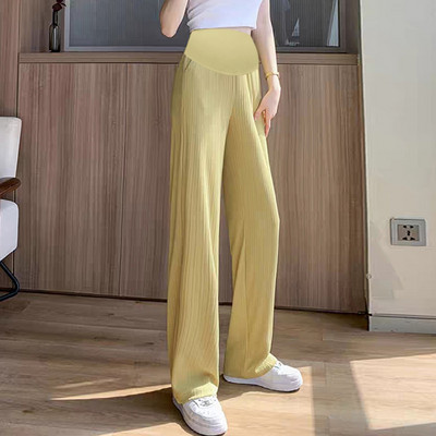 Széles szárú kismamanadrág magas derékkal és zsebekkel