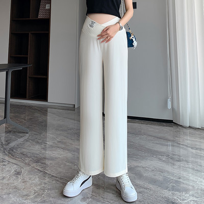 Széles modell elasztikus kismamanadrág logóval