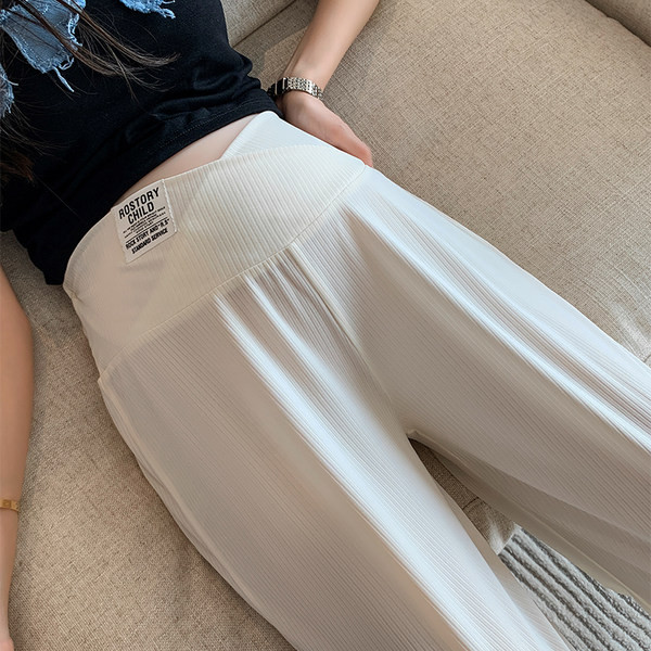 Széles modell elasztikus kismamanadrág logóval