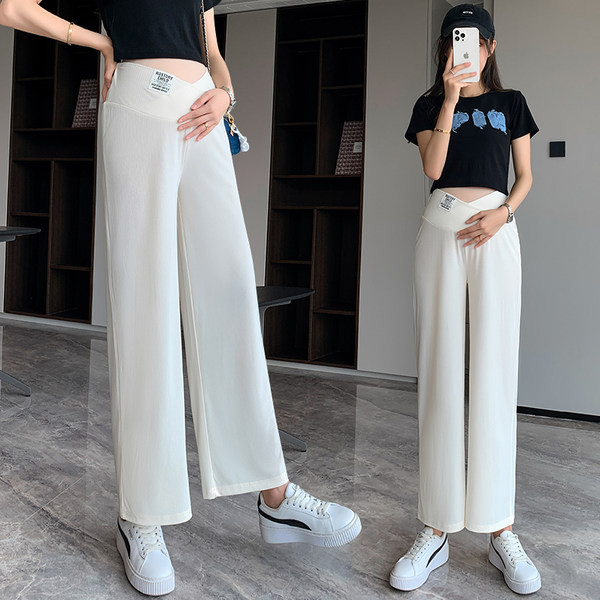 Széles modell elasztikus kismamanadrág logóval