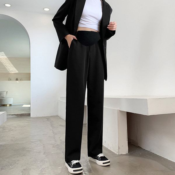 Elegáns női nadrág széles övvel, kismama zsebbel