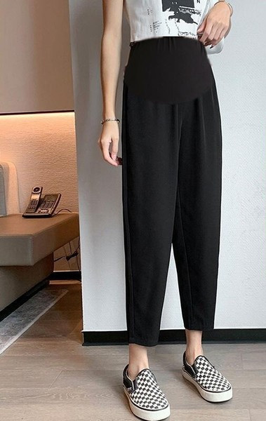 Pikad taskutega ja laia kummiga naistepüksid rasedatele