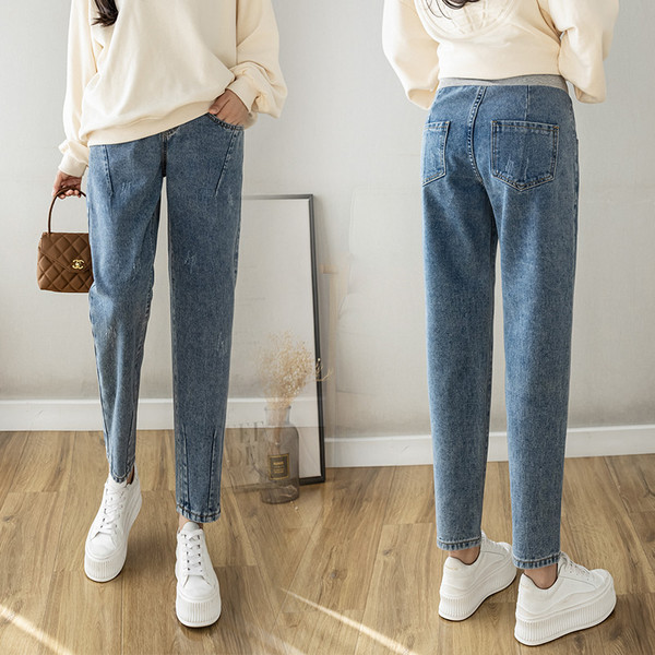 Női farmer széles gumival és zsebbel terhes nők számára