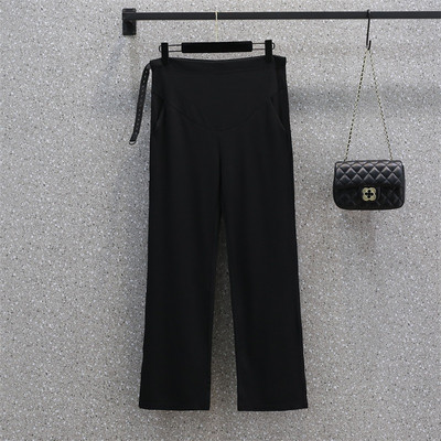 Elegáns női kismamanadrág hasítással