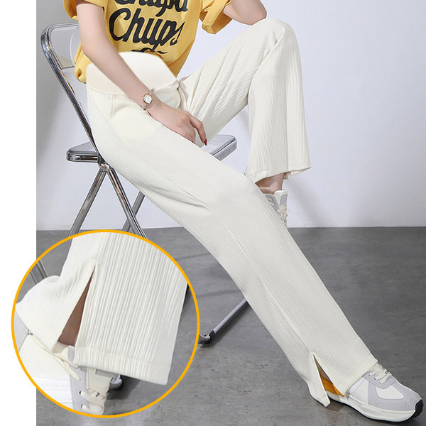 Elegáns női kismamanadrág hasítással