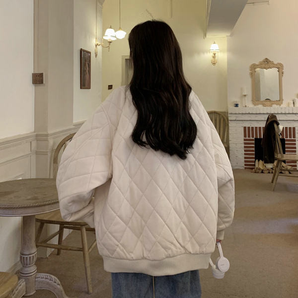 Női őszi kabát bő mintával - cipzárral