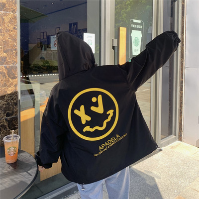 Női őszi kabát mintával és cipzárral