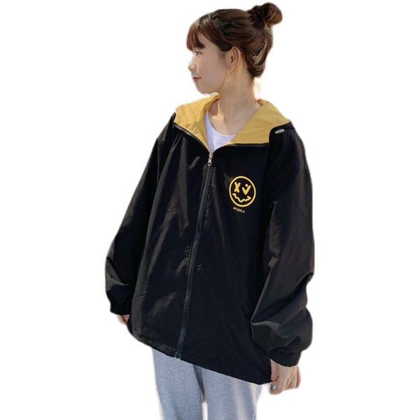 Női őszi kabát mintával és cipzárral