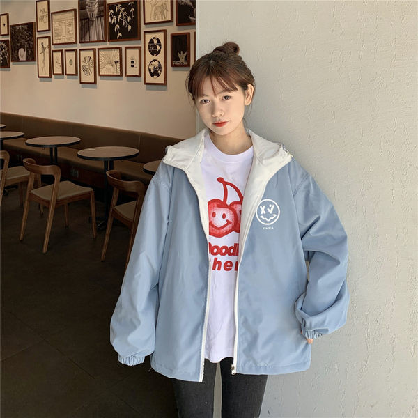 Női őszi kabát mintával és cipzárral