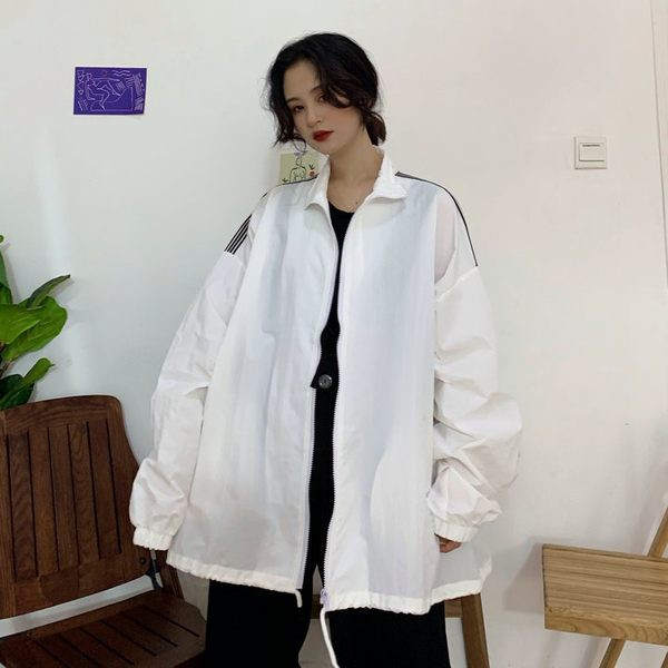 Alkalmi női kabát cipzárral és zsebbel