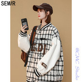 Sportdzseki dekoratív nyomattal és gombokkal