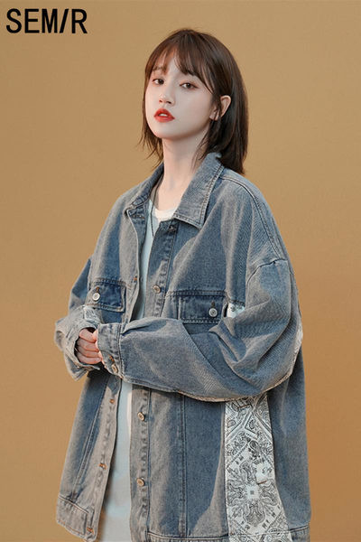 Γυναικείο τζιν μπουφάν με διακοσμητικό στάμπα