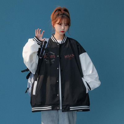 Női őszi kabát bő mintával, gombokkal