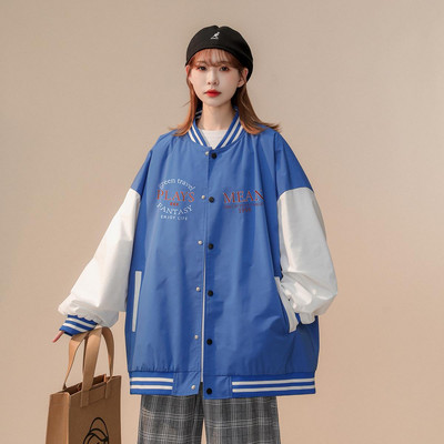 Női őszi kabát bő mintával, gombokkal