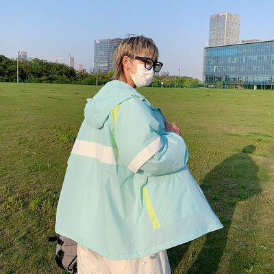 Női alkalmi kabát cipzárral és gumival