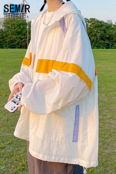 Női alkalmi kabát cipzárral és gumival