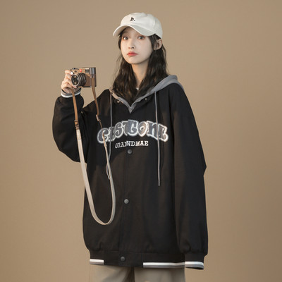 Női széles modellkabát cipzárral és zsebbel