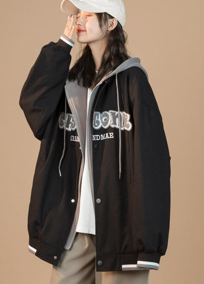 Női széles modellkabát cipzárral és zsebbel