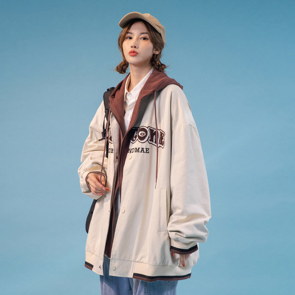 Női széles modellkabát cipzárral és zsebbel