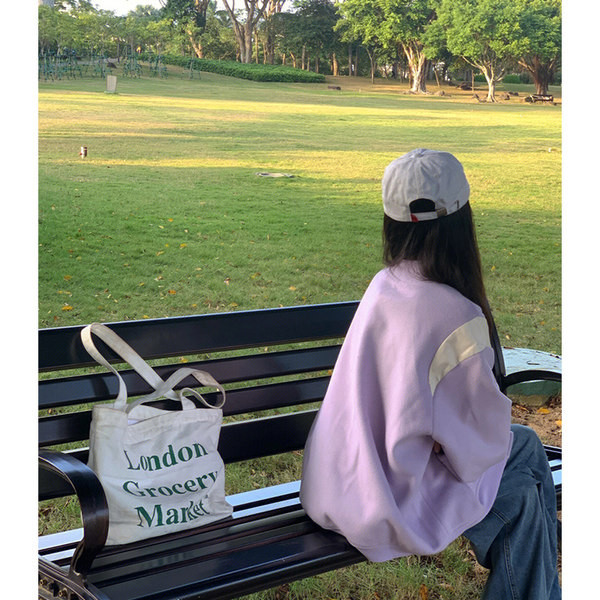 Alkalmi női kabát zsebbel és gombokkal