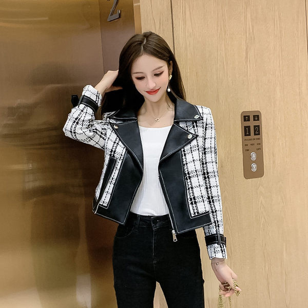 Női bőrkabát cipzárral és díszítéssel