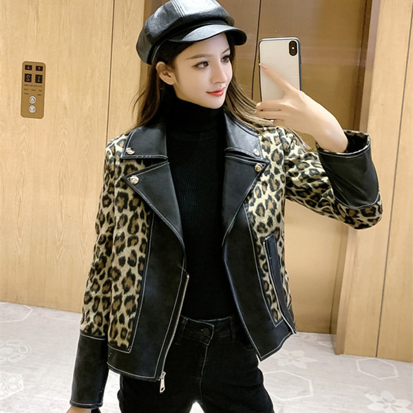 Női bőrkabát cipzárral és díszítéssel