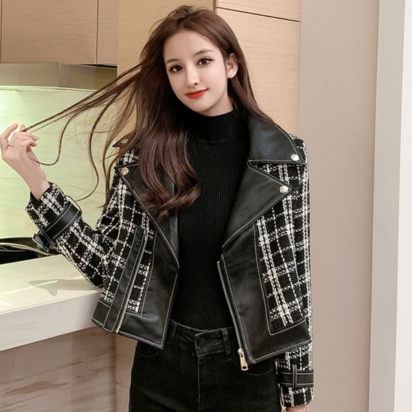 Női bőrkabát cipzárral és díszítéssel