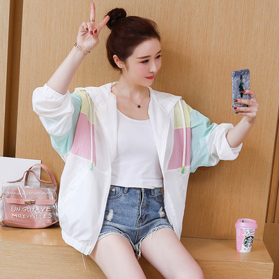 Női őszi kabát kapucnival és UV védelemmel