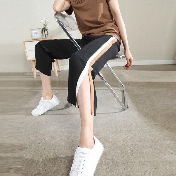 Naiste kõrge vöökohaga püksid – lahtised 7/8 mustriga