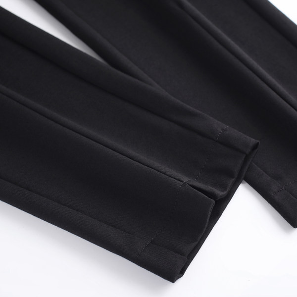 Naiste elegantsed vöö ja taskuga püksid